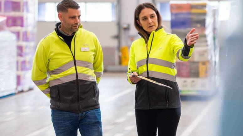 Warehouse colleagues checking stock