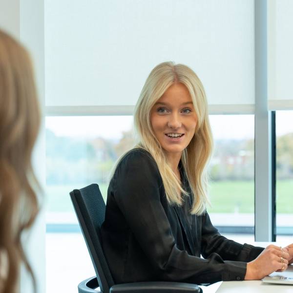 Comms - Rhianna at Desk
